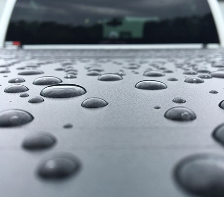 Rubber seals and drain tubes channel water away from and out of the bed.